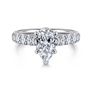 Gabriel & Co. ER15247P6W44JJ 14 karat white gold Classic engagement ring, front view of the pear shaped center with its pointed tip prong and larger diamonds on the shoulders