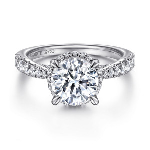 Gabriel & Co. ER15350R8W44JJ 14 karat white gold Victorian engagement ring, front view of a round center with rounded prong tips and diamonds along the band