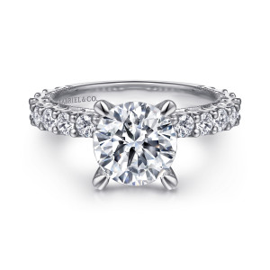 Gabriel & Co. ER15358R8W44JJ 14 karat white gold Victorian engagement ring, front view of a round center with round stones running back along the band on both sides