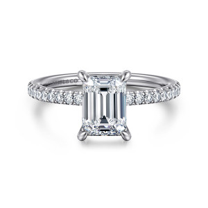 Gabriel & Co. ER15525E6W44JJ 14 karat white gold Classic engagement ring, front view of an emerald cut center in corner claws with small diamonds along the slim band