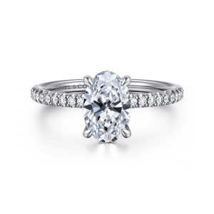 Gabriel & Co. ER15525O6W44JJ 14 karat white gold Classic engagement ring, front view of an oval center with a claw at each corner and diamonds along the band