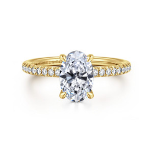 Gabriel & Co. ER15525O6Y44JJ 14 karat yellow gold Classic engagement ring, front view of an oval center with band diamonds meeting it at either side