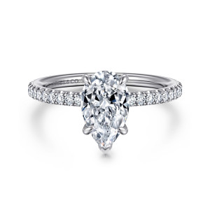Gabriel & Co. ER15525P6W44JJ 14 karat white gold Classic engagement ring, front view of a pear shaped center, a V tip at its point and diamonds along the band