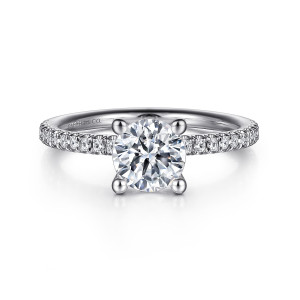 Gabriel & Co. ER15525R4W44JJ 14 karat white gold Classic engagement ring, front view of a round center held by four bead tipped prongs, diamonds on both shoulders