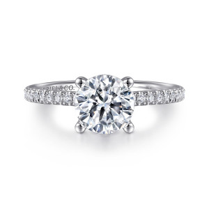 Gabriel & Co. ER15525R6W44JJ 14 karat white gold Classic engagement ring, front view of a round center between four ball tipped prongs, with diamonds on both shoulders