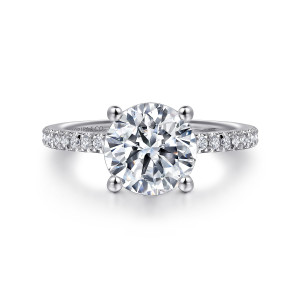Gabriel & Co. ER15525R8W44JJ 14 karat white gold Classic engagement ring, front view of a round center on four ball tipped prongs with diamonds set beside the head