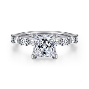 Gabriel & Co. ER15607S6W44JJ 14 karat white gold Contemporary engagement ring, front view of the square center with corner prongs and round and elongated diamonds spaced along the band