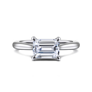 Gabriel & Co. ER15618E6W4JJJ 14 karat white gold Classic engagement ring, front view of a sideways emerald cut center with corner claw prongs on a smooth band