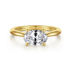 Gabriel & Co. ER15618O6Y4JJJ 14 karat yellow gold Classic engagement ring, front view of a sideways oval center in four rounded tip prongs on a smooth band