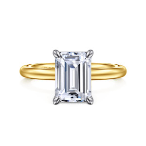 Gabriel & Co. ER15619E10M4JJJ 14 karat white and yellow gold Classic engagement ring, front view of an emerald cut center held by four rounded tip claws at the corners