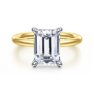 Gabriel & Co. ER15619E12M4JJJ 14 karat white and yellow gold Classic engagement ring, front view of the plain rounded band behind the emerald cut center