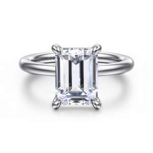 Gabriel & Co. ER15619E12PTJJJ platinum Classic engagement ring, front view of an emerald cut seat held by four rounded claws on a smooth polished band