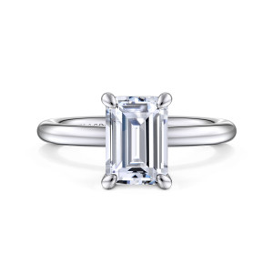 Gabriel & Co. ER15619E8W4JJJ 14 karat white gold Classic engagement ring, front view of an emerald cut center with rounded prong tips over a smooth band