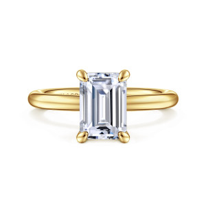 Gabriel & Co. ER15619E8Y4JJJ 14 karat yellow gold Classic engagement ring, front view of the emerald cut center in four rounded prongs on a smooth band
