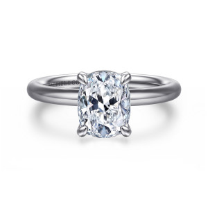 Gabriel & Co. ER15619G8W4JJJ 14 karat white gold Classic engagement ring, front view of an elongated cushion center held by four claw prongs on a smooth round band