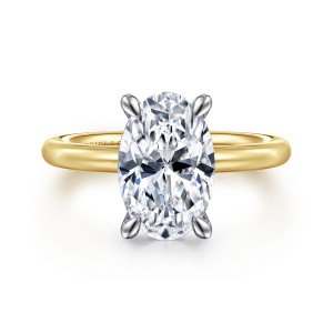 Gabriel & Co. ER15619O12M4JJJ 14 karat white and yellow gold Classic engagement ring, front view of an oval center held by four tapered prongs above a smooth band