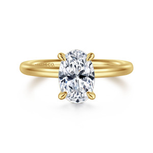 Gabriel & Co. ER15619O6Y4JJJ 14 karat yellow gold Classic engagement ring, front view of the oval center with slender prongs at its ends and a smooth plain band