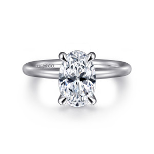 Gabriel & Co. ER15619O8W4JJJ 14 karat white gold Classic engagement ring, front view of slim claw prongs with rounded tips holding an oval center above a smooth band