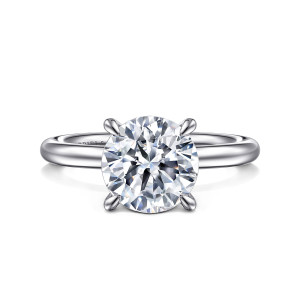 Gabriel & Co. ER15619R10W4JJJ 14 karat white gold Classic engagement ring, front view of a round center held by four rounded claws over a smooth band