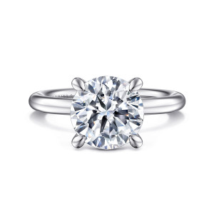 Gabriel & Co. ER15619R12PTJJJ platinum Classic engagement ring, front view of a round center held by four teardrop shaped prongs on a smooth band