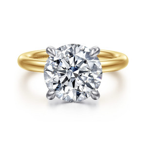 Gabriel & Co. ER15619R16M4JJJ 14 karat white and yellow gold Classic engagement ring, front view of a round center gripped by four tapered prongs above a smooth, rounded band