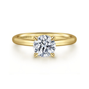 Gabriel & Co. ER15619R4Y4JJJ 14 karat yellow gold Classic engagement ring, front view of the round center between four slender prongs on a narrow smooth band