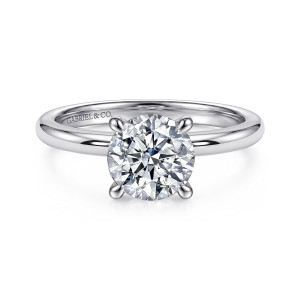 Gabriel & Co. ER15619R6VW4JJJ 14 karat white gold Classic engagement ring, front view of a round center held by four ball tipped prongs on a smooth rounded band