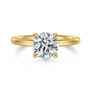 Gabriel & Co. ER15619R6Y4JJJ 14 karat yellow gold Classic engagement ring, front view of a round center held by pointed prongs on a smooth plain band