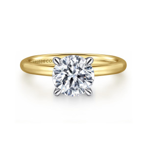 Gabriel & Co. ER15619R8M4JJJ 14 karat white and yellow gold Classic engagement ring, front view of a round center held at the corners by prongs with rounded tips