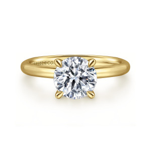 Gabriel & Co. ER15619R8Y4JJJ 14 karat yellow gold Classic engagement ring, front view of a round center held by four pointed prongs on a smooth rounded band