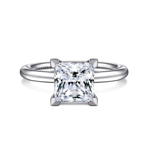 Gabriel & Co. ER15619S8W4JJJ 14 karat white gold Classic engagement ring, front view of a princess cut center gripped at each corner by a flat topped prong