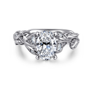 Gabriel & Co. ER15626O6W44JJ 14 karat white gold Floral Nouveau engagement ring, front view of an oval center with leaf shaped frames of small diamonds at both shoulders