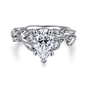 Gabriel & Co. ER15626P6W44JJ 14 karat white gold Floral Nouveau engagement ring, front view of a pear shaped center with a pointed guard among leaf frames