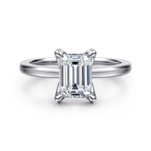 Gabriel & Co. ER15702E6W4JJJ 14 karat white gold Classic engagement ring, front view of an emerald cut center held by four claw like prongs above a plain band
