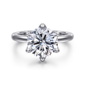Gabriel & Co. ER15702R12W4JJJ 14 karat white gold Classic engagement ring, front view of a round center gripped by six prongs with rounded tips above a smooth band