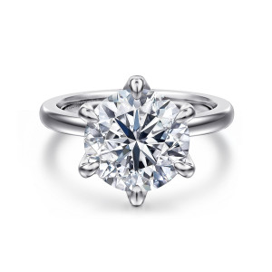 Gabriel & Co. ER15702R16W4JJJ 14 karat white gold Classic engagement ring, front view of a round center with six teardrop tipped prongs and a maker's mark inside the band