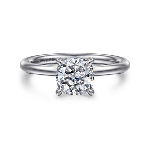 Gabriel & Co. ER15739C6W44JJ 14 karat white gold Classic engagement ring, front view of a cushion cut center on pointed prongs above a slim smooth band