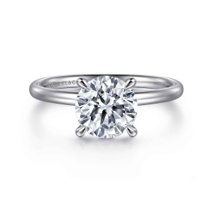 Gabriel & Co. ER15739R8PT4JJ platinum Classic engagement ring, front view of a round center held by four rounded claw prongs on a smooth band