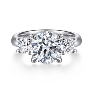 Gabriel & Co. ER15820R12W44JJ 14 karat white gold Classic engagement ring, front view of a round center between smaller round diamonds on a smooth polished band