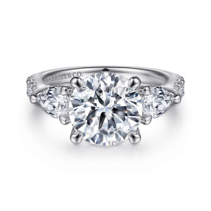 Gabriel & Co. ER15838R12W44JJ 14 karat white gold Classic engagement ring, front view of a round center between pear shaped side stones with small stones on the shoulders