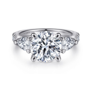 Gabriel & Co. ER15838R12W84JJ 18 karat white gold Classic engagement ring, front view of a round center between pear shaped side stones, held by claw prongs