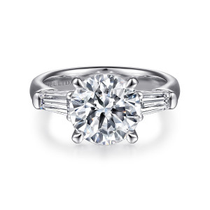 Gabriel & Co. ER15843R12W43JJ 14 karat white gold Classic engagement ring, front view of a round center between two tapered baguette stones on a polished band