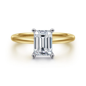 Gabriel & Co. ER15960E6M4JJJ 14 karat white and yellow gold Classic engagement ring, front view of an emerald cut center held at its corners by four rounded prongs