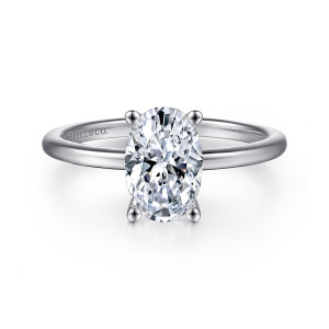 Gabriel & Co. ER15960O6W4JJJ 14 karat white gold Classic engagement ring, front view of an oval center held by four rounded prongs on a smooth thin band