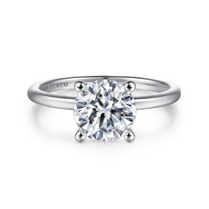 Gabriel & Co. ER15960R6PTJJJ platinum Classic engagement ring, front view of a round center between four ball tipped prongs on a thin polished band