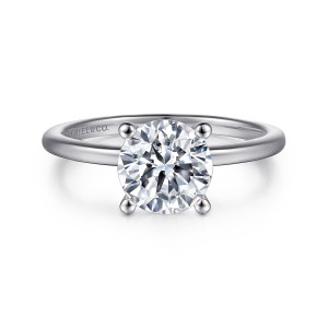 Gabriel & Co. ER15960R6W4JJJ 14 karat white gold Classic engagement ring, front view of a round center held by bead tipped prongs above a fine band