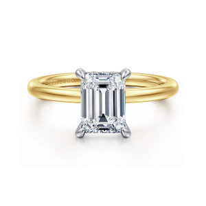 Gabriel & Co. ER15972E6M44JJ 14 karat white and yellow gold Classic engagement ring, front view of an emerald cut center with four claw prongs on a smooth round band