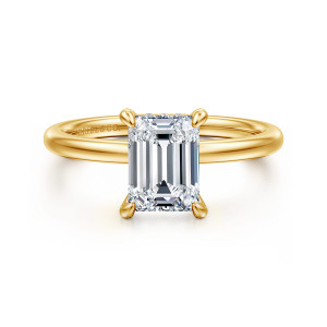 Gabriel & Co. ER15972E6Y84JJ 18 karat yellow gold Classic engagement ring, front view of an emerald cut center with four rounded tip prongs on a smooth band