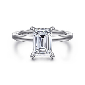Gabriel & Co. ER15972E8W44JJ 14 karat white gold Classic engagement ring, front view of an emerald cut center in four rounded tip prongs on a smooth plain band