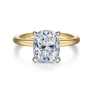 Gabriel & Co. ER15972G10M44JJ 14 karat white and yellow gold Classic engagement ring, front view of an elongated cushion center held by four claw prongs above a plain band